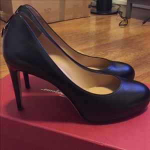 Salvatore Ferragamo heels size 8.
